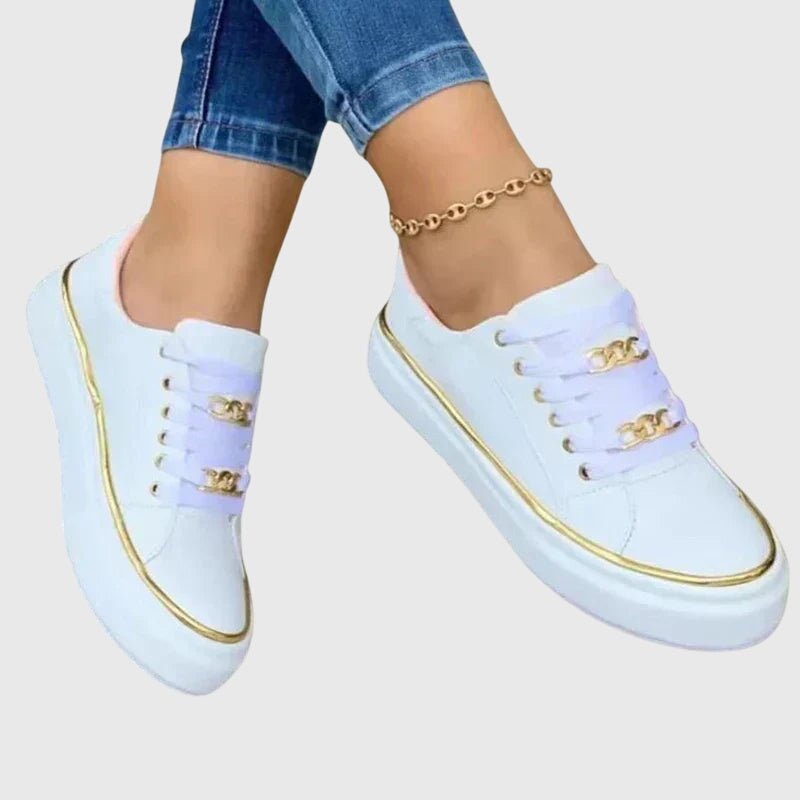 Serena Winthrop | Black Platform Sneakers with Gold Chain Detail