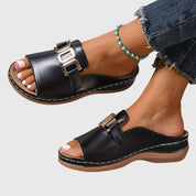 Lucinda Vanbrace | White Gold Buckle Slip-On Sandals