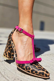 Vittoria Sandrelli | Leopard Print T-Strap Heels with Pink Bow Accent