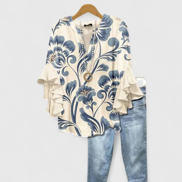 Celestine Ravenmore | Blue Floral Ruffle Sleeve Blouse
