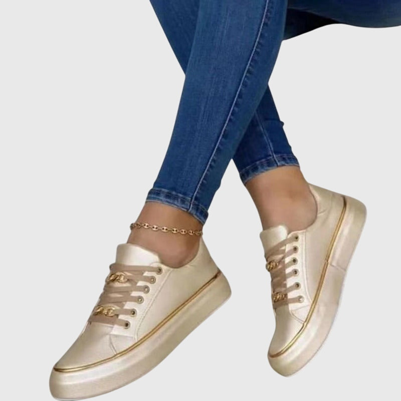 Serena Winthrop | Black Platform Sneakers with Gold Chain Detail