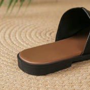 Margolaine Dubreuil | Black Faux Leather Flat Slide Sandals