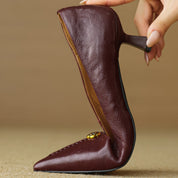 Violette Sanscourt | Burgundy Leather Pointed-Toe Heels with Gold Rose Detail