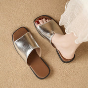 Margolaine Dubreuil | Black Faux Leather Flat Slide Sandals