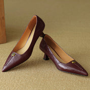 Violette Sanscourt | Burgundy Leather Pointed-Toe Heels with Gold Rose Detail