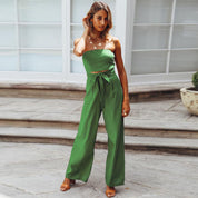 Allegra Vossbourne | Strapless Tie Waist Wide Leg Jumpsuit in Beige