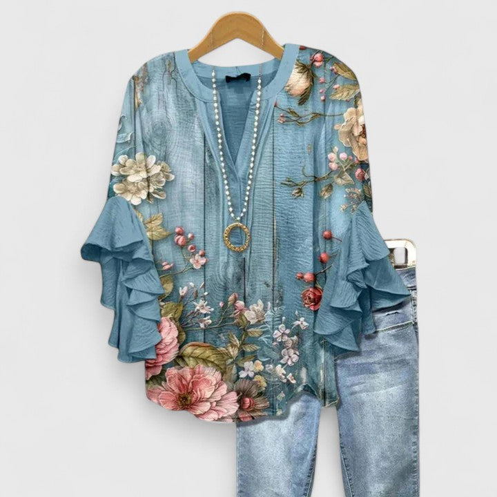 Celestine Ravenmore | Blue Floral Ruffle Sleeve Blouse