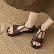Claudia Ravensworth | Black Braided T-Strap Flat Sandals