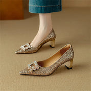 Clarisse Valenthorpe | Gold Glitter Block Heel Pumps with Crystal Buckle
