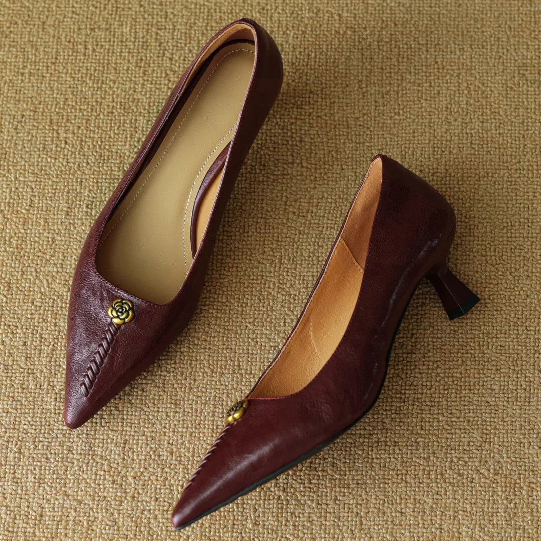 Violette Sanscourt | Burgundy Leather Pointed-Toe Heels with Gold Rose Detail