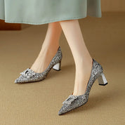 Clarisse Valenthorpe | Gold Glitter Block Heel Pumps with Crystal Buckle