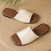Margolaine Dubreuil | Black Faux Leather Flat Slide Sandals