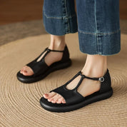 Claudia Ravensworth | Black Braided T-Strap Flat Sandals