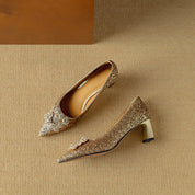 Clarisse Valenthorpe | Gold Glitter Block Heel Pumps with Crystal Buckle