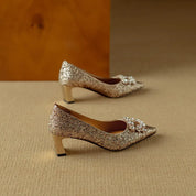 Clarisse Valenthorpe | Gold Glitter Block Heel Pumps with Crystal Buckle