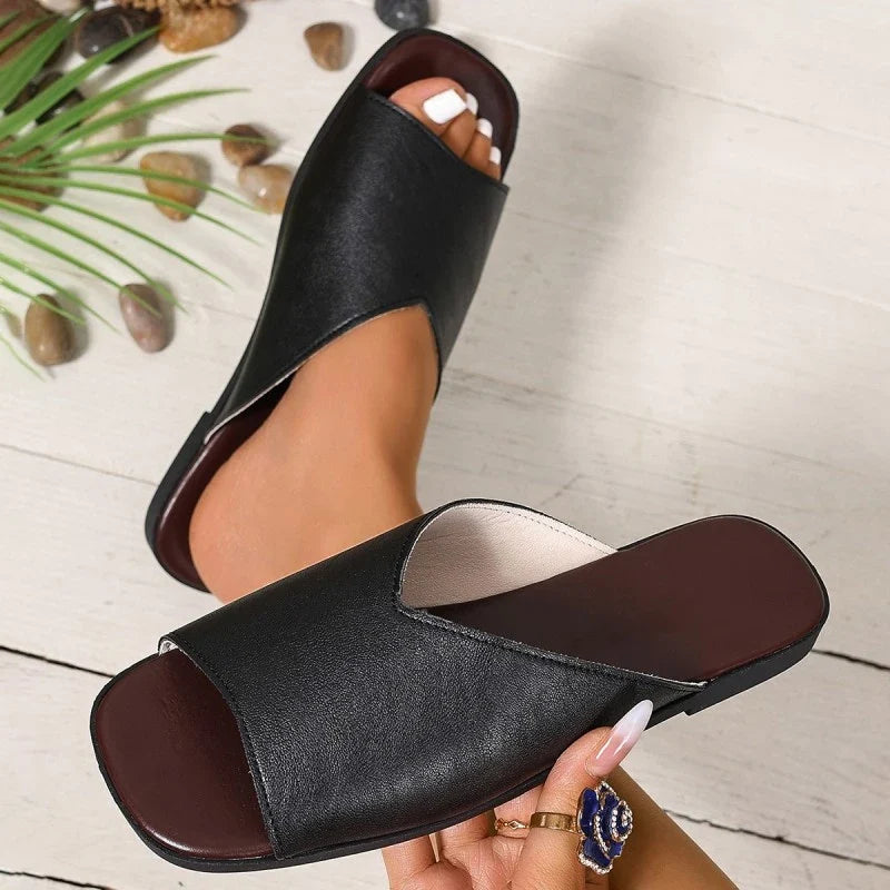 Séraphine Dawnbury | Black Flat Open-Toe Slide Sandals