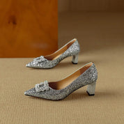 Clarisse Valenthorpe | Gold Glitter Block Heel Pumps with Crystal Buckle