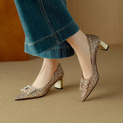 Clarisse Valenthorpe | Gold Glitter Block Heel Pumps with Crystal Buckle