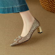 Clarisse Valenthorpe | Gold Glitter Block Heel Pumps with Crystal Buckle