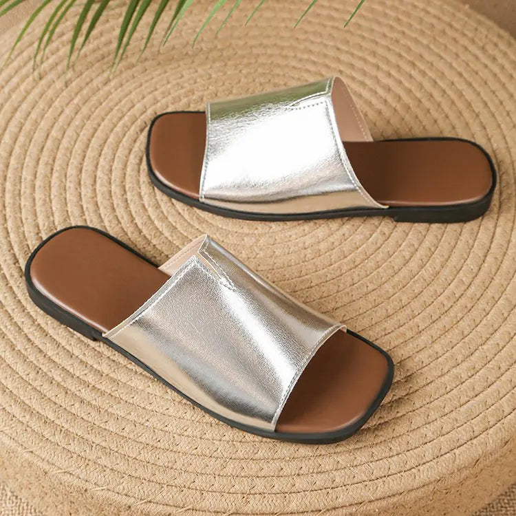 Margolaine Dubreuil | Black Faux Leather Flat Slide Sandals