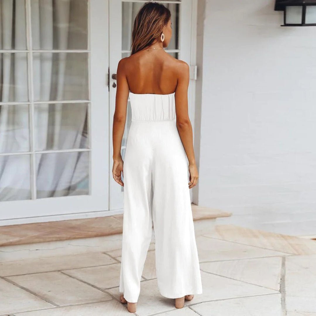 Allegra Vossbourne | Strapless Tie Waist Wide Leg Jumpsuit in Beige
