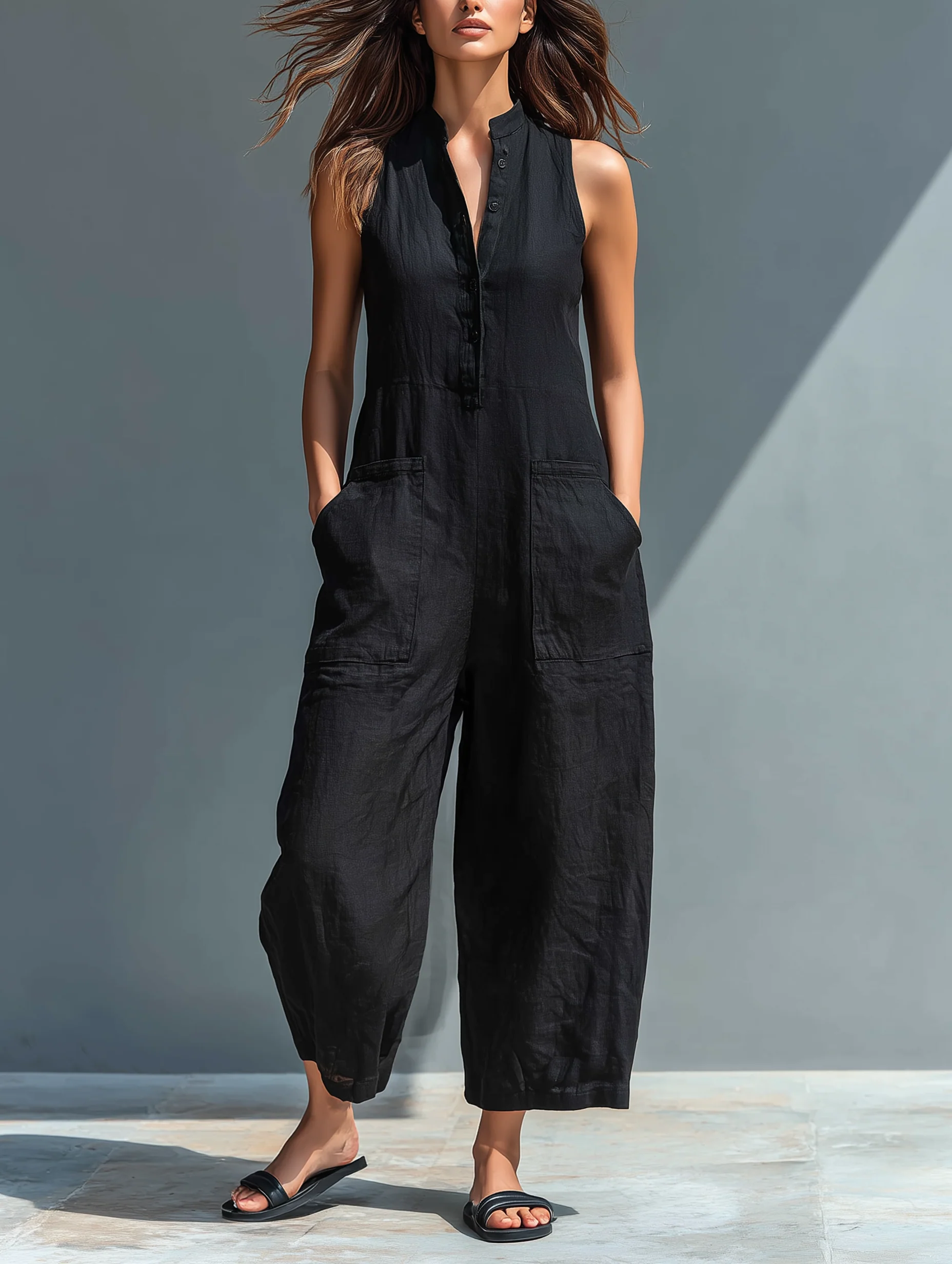 Aria Johnson | Sleeveless Loose-Fit Linen Jumpsuit in Black