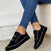 Genevra Whitmore | White Platform Sneakers with Gold Chain Detail