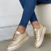 Genevra Whitmore | White Platform Sneakers with Gold Chain Detail