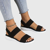 Auriane Whitfield | Black Double-Strap Orthopedic Flat Sandals
