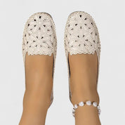 Celestine Fairvaux | White Hollow-Cut Slip-On Flat Loafers