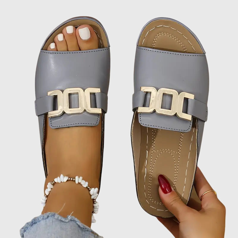 Lucinda Vanbrace | White Gold Buckle Slip-On Sandals