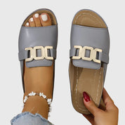 Lucinda Vanbrace | White Gold Buckle Slip-On Sandals