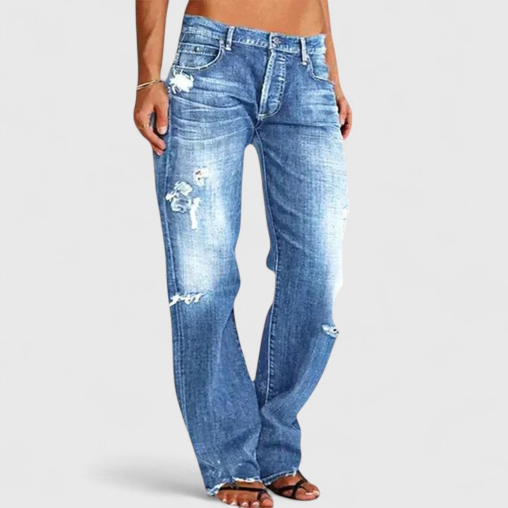 Auriane Leclercq | Low Rise Distressed Straight Leg Jeans in Light Blue
