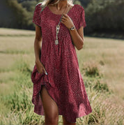 Roseline Montvert | Boho Floral Print Short Sleeve Midi Dress
