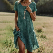 Roseline Montvert | Boho Floral Print Short Sleeve Midi Dress